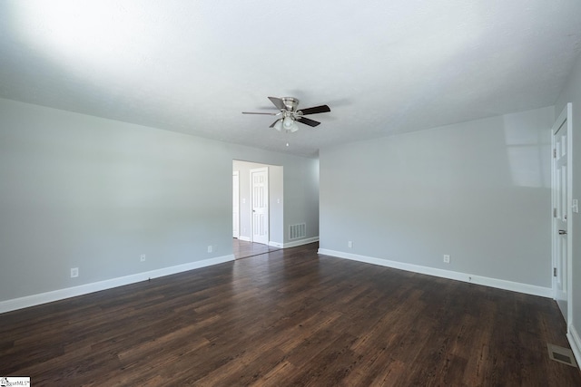 474 Lindsey Lake Rd, Travelers Rest, SC 29690 - spare room with a ceiling fan, dark wood-type flooring, and baseboards