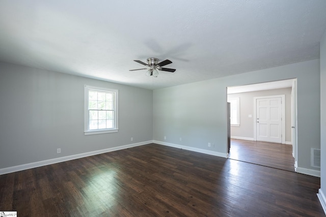 474 Lindsey Lake Rd, Travelers Rest, SC 29690 - spare room featuring a ceiling fan, dark wood-style floors, and baseboards