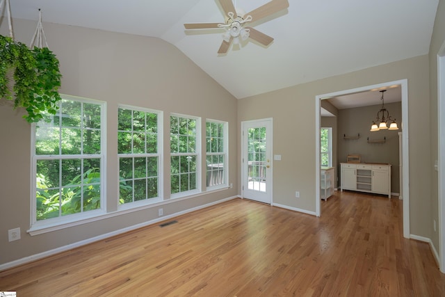 104 White Bark Way, Taylors, SC 29687 - spare room featuring light wood-style flooring, a ceiling fan, baseboards, a chandelier, and high vaulted ceiling