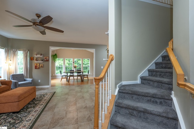 104 White Bark Way, Taylors, SC 29687 - staircase with ceiling fan and baseboards