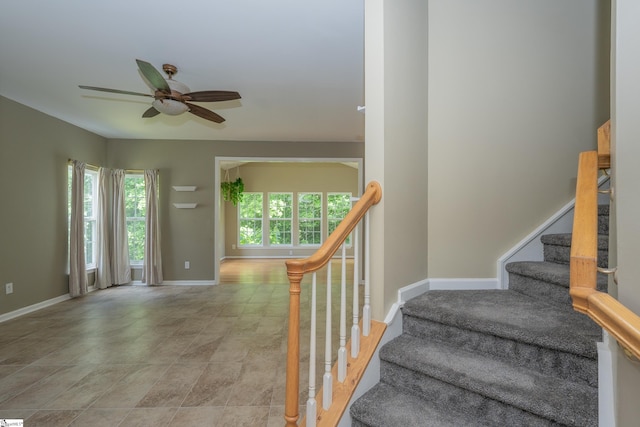 104 White Bark Way, Taylors, SC 29687 - stairs with a ceiling fan and baseboards
