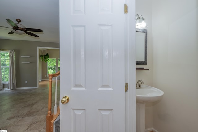 104 White Bark Way, Taylors, SC 29687 - bathroom featuring plenty of natural light, ceiling fan, and baseboards