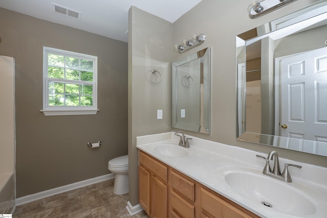 104 White Bark Way, Taylors, SC 29687 - bathroom with toilet, baseboards, double vanity, and a shower