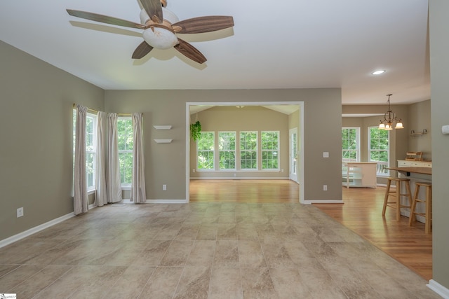 104 White Bark Way, Taylors, SC 29687 - unfurnished living room with a ceiling fan, baseboards, a chandelier, and recessed lighting