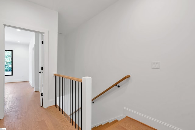 19 Conwell St, Greenville, SC 29601 - hall with an upstairs landing, light wood-type flooring, and baseboards