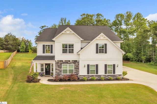 153 Coppermine Dr, Easley, SC 29642 - view of front of property featuring stone siding, concrete driveway, a front lawn, and board and batten siding