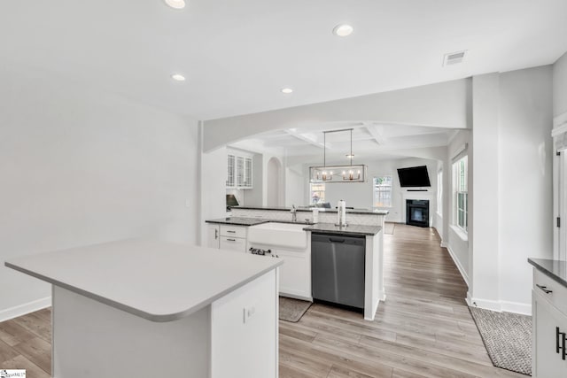 153 Coppermine Dr, Easley, SC 29642 - kitchen featuring dishwasher, a sink, recessed lighting, light wood-style flooring, and white cabinetry