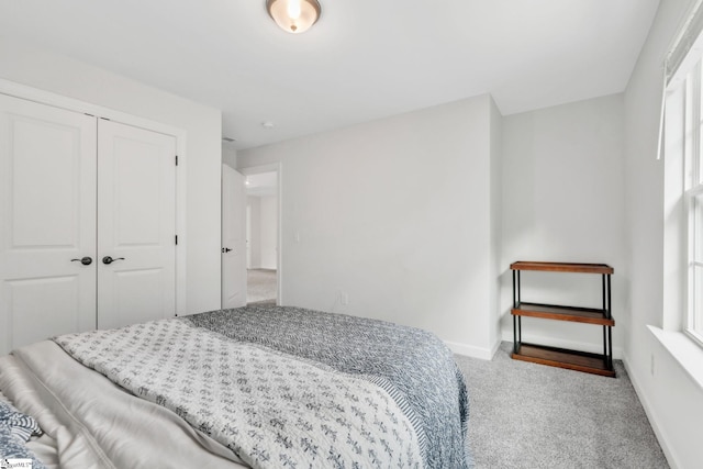 153 Coppermine Dr, Easley, SC 29642 - carpeted bedroom featuring baseboards, a closet, and multiple windows