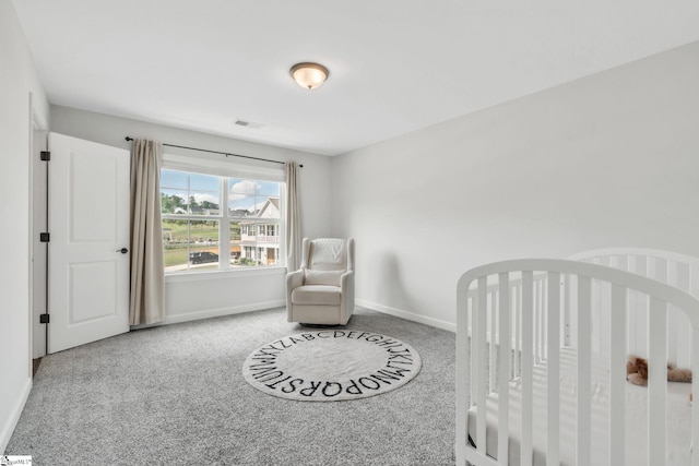 153 Coppermine Dr, Easley, SC 29642 - carpeted bedroom with baseboards and a nursery area