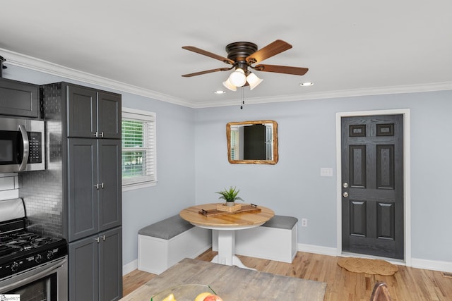 dining area featuring a ceiling fan, baseboards, light wood-style floors, ornamental molding, and recessed lighting