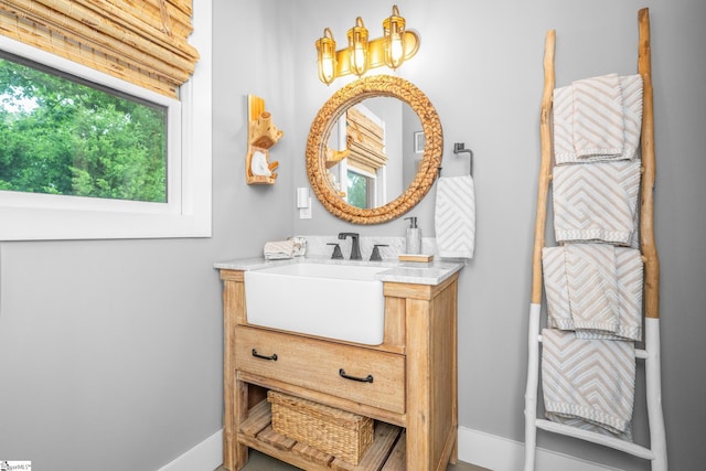 653 R B Baker Dr, Chapin, SC 29036 - bathroom featuring baseboards and vanity