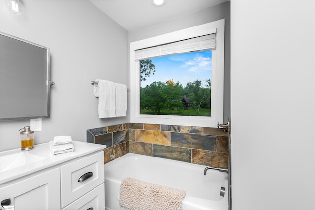 653 R B Baker Dr, Chapin, SC 29036 - full bathroom featuring a garden tub, vanity, and recessed lighting