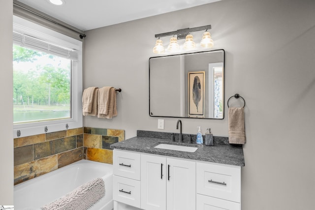 653 R B Baker Dr, Chapin, SC 29036 - full bathroom featuring a garden tub and vanity