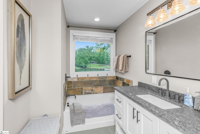 653 R B Baker Dr, Chapin, SC 29036 - full bathroom with a garden tub, vanity, and recessed lighting
