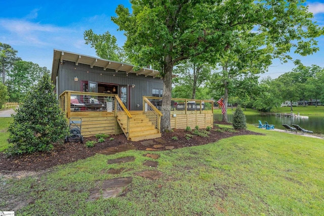 653 R B Baker Dr, Chapin, SC 29036 - rear view of house featuring a deck with water view and a yard