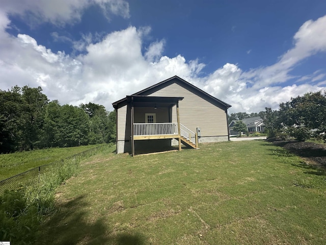 back of property with a yard