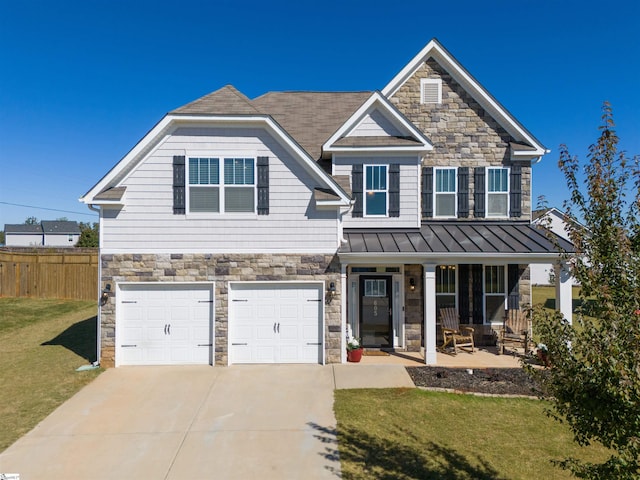 605 Mosque Ln, Lyman, SC 29365 - view of front of house with covered porch, stone siding, driveway, a garage, and a standing seam roof