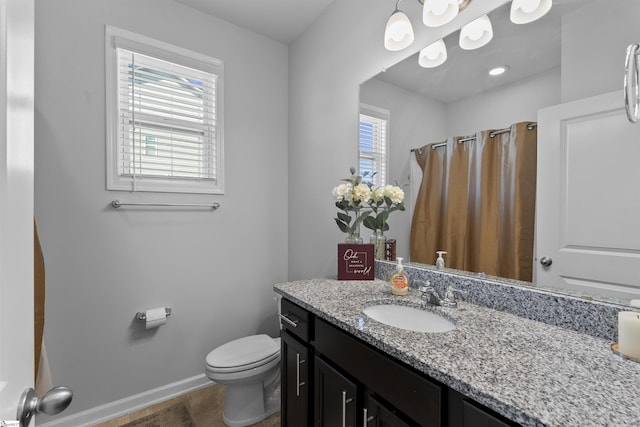 605 Mosque Ln, Lyman, SC 29365 - full bath featuring toilet, vanity, baseboards, and a shower with shower curtain