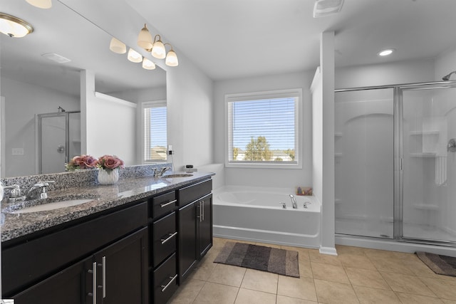 605 Mosque Ln, Lyman, SC 29365 - full bath with a stall shower, tile patterned flooring, double vanity, a garden tub, and recessed lighting