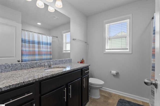 605 Mosque Ln, Lyman, SC 29365 - full bath featuring toilet, baseboards, plenty of natural light, and vanity