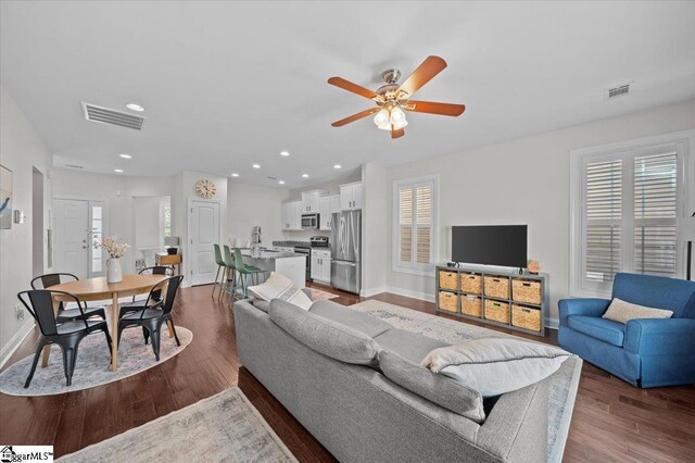 6 Kelvyn St, Greer, SC 29651 - living area with baseboards, a ceiling fan, healthy amount of natural light, dark wood-style floors, and recessed lighting