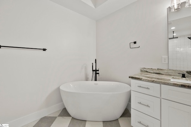bathroom with baseboards, a soaking tub, vanity, and tiled shower