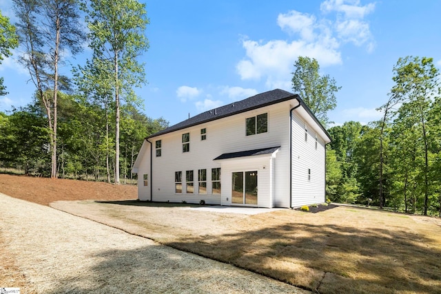back of house featuring a patio