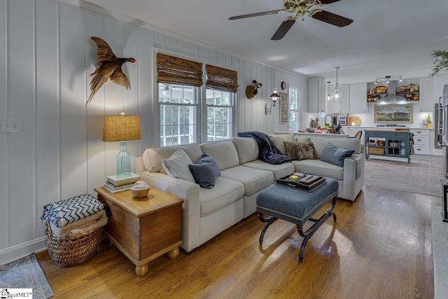 202 Roberta Dr, Greenville, SC 29615 - living room with ornamental molding, light wood-style floors, a decorative wall, and ceiling fan