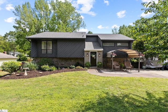 7 Bendingwood Cir, Taylors, SC 29687 - view of front facade with a front yard, a patio, stone siding, and roof with shingles