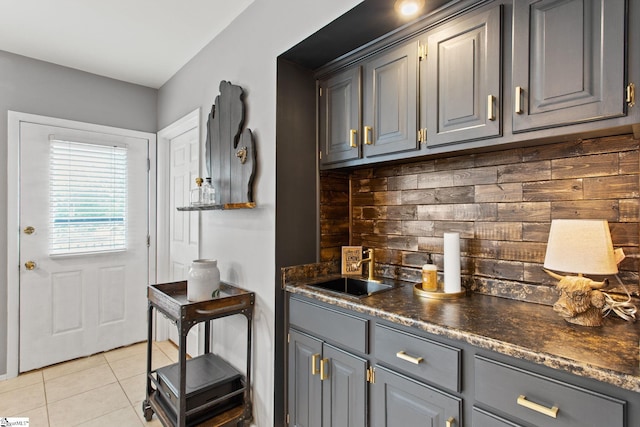 7 Bendingwood Cir, Taylors, SC 29687 - bar with a sink, light tile patterned flooring, and backsplash