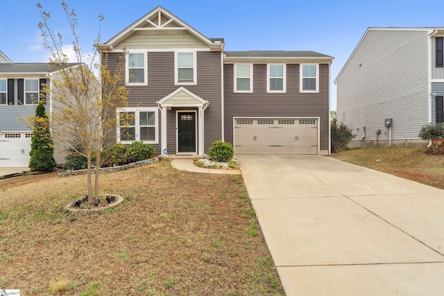 625 Mccormick Ln, Lyman, SC 29365 - view of front of home featuring a garage, concrete driveway, and a front yard