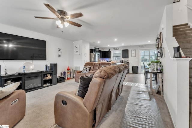 625 Mccormick Ln, Lyman, SC 29365 - living area with light carpet, a ceiling fan, stairs, and recessed lighting