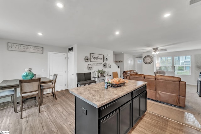 625 Mccormick Ln, Lyman, SC 29365 - kitchen with light countertops, ceiling fan, a kitchen island, light wood-style floors, and recessed lighting