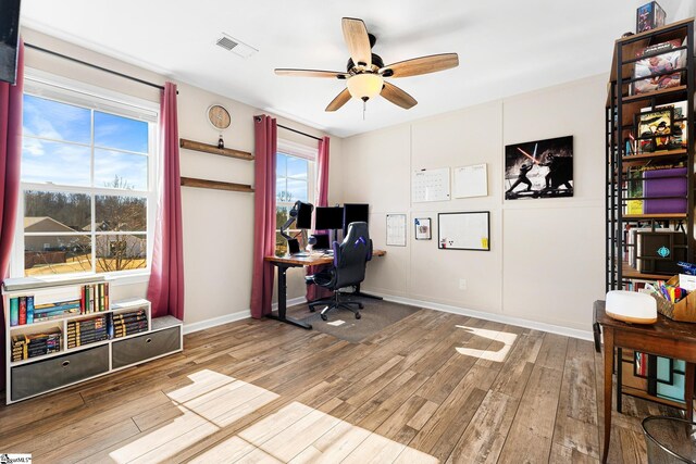 110 Avendell Dr, Easley, SC 29642 - office space featuring wood finished floors, a ceiling fan, and baseboards
