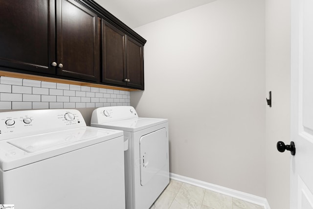 110 Avendell Dr, Easley, SC 29642 - washroom featuring cabinet space, washer and dryer, and baseboards
