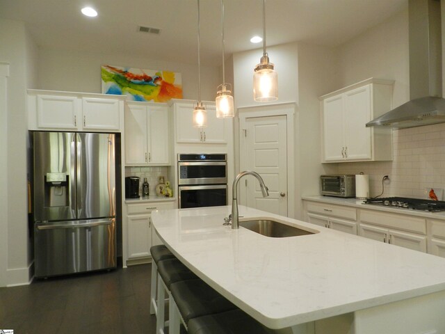 14 Moray Pl, Simpsonville, SC 29681 - kitchen with appliances with stainless steel finishes, a sink, wall chimney exhaust hood, recessed lighting, and backsplash