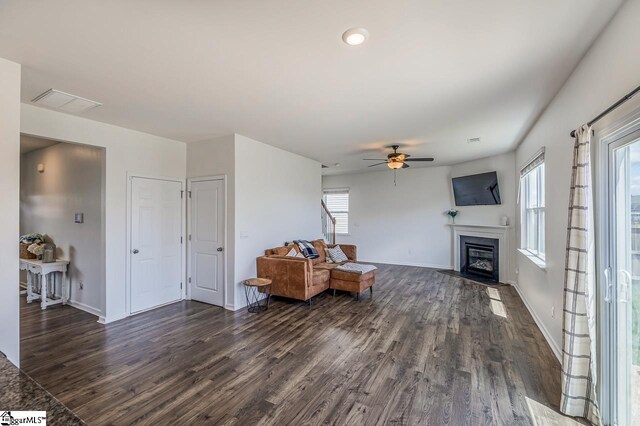 115 Slateford Cir, Piedmont, SC 29673 - living room featuring dark wood-style floors, plenty of natural light, a ceiling fan, a fireplace with flush hearth, and recessed lighting