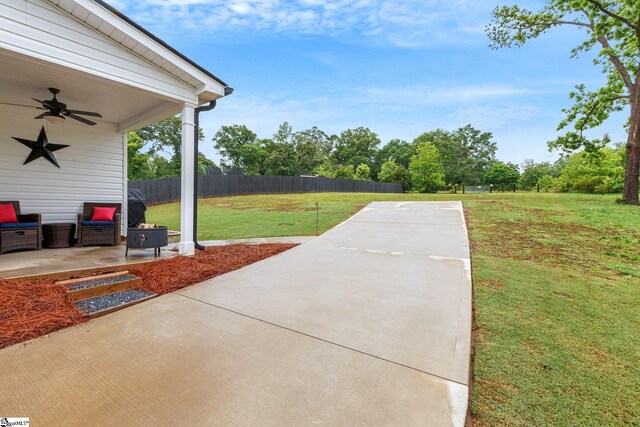 view of patio / terrace featuring a ceiling fan