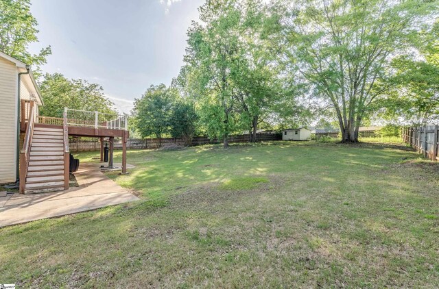 105 Bitternut Ln, Taylors, SC 29687 - view of yard with stairs, a shed, a deck, and an outbuilding