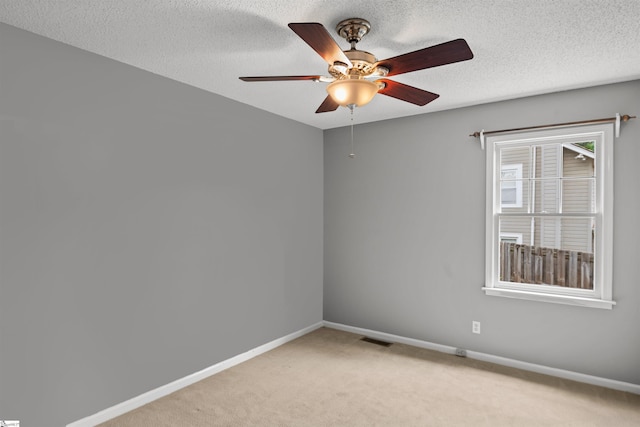 32 Circleview Dr, Taylors, SC 29687 - unfurnished room featuring light colored carpet, ceiling fan, baseboards, and a textured ceiling
