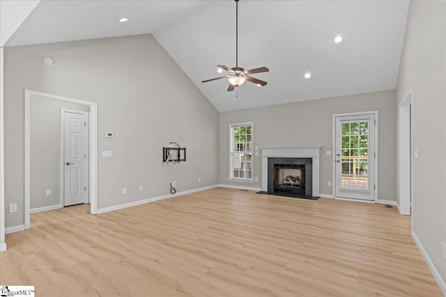 2575 Old Ansel School Rd, Greer, SC 29651 - unfurnished living room with plenty of natural light, high vaulted ceiling, a ceiling fan, light wood-type flooring, and recessed lighting