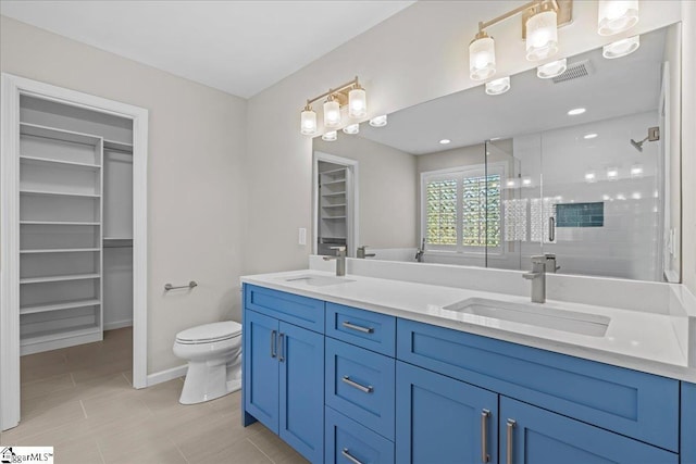 2575 Old Ansel School Rd, Greer, SC 29651 - full bath with a shower stall, tile patterned floors, double vanity, a walk in closet, and toilet