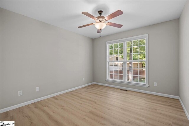 2575 Old Ansel School Rd, Greer, SC 29651 - empty room with light wood-type flooring, baseboards, and a ceiling fan