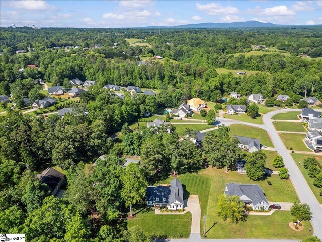 2575 Old Ansel School Rd, Greer, SC 29651 - aerial view of property's location with a heavily wooded area and nearby suburban area