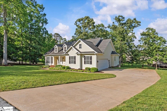 2575 Old Ansel School Rd, Greer, SC 29651 - cape cod home featuring driveway, a garage, a front yard, and a porch