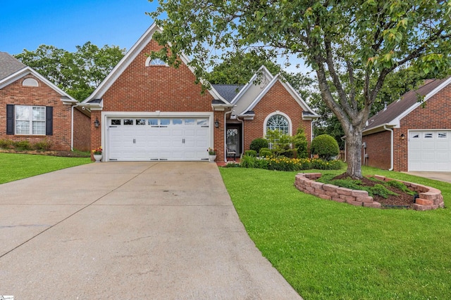 413 Rambling Rose Way, Moore, SC 29369 - traditional-style house featuring a front lawn, brick siding, driveway, and an attached garage