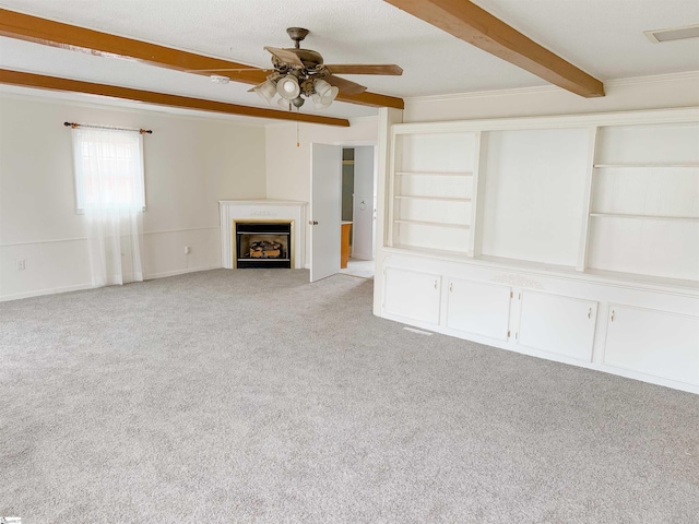 8 Charing Cross Rd, Taylors, SC 29687 - unfurnished living room featuring beamed ceiling, ceiling fan, light colored carpet, and a fireplace