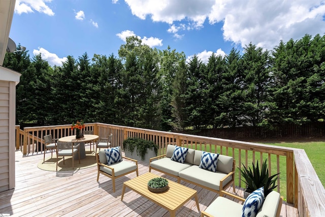 deck featuring an outdoor living space and outdoor dining space