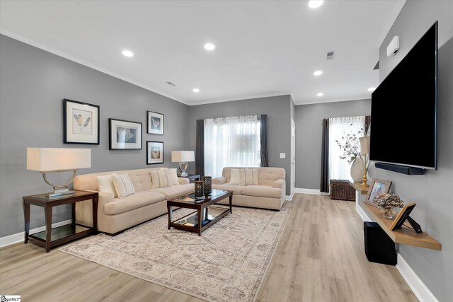 40 Ridgestone Cir, Mauldin, SC 29662 - living room with light wood finished floors, baseboards, crown molding, and recessed lighting