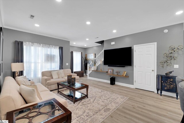 40 Ridgestone Cir, Mauldin, SC 29662 - living area with light wood-type flooring, stairs, recessed lighting, crown molding, and baseboards